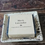 Black Lavender activated charcoal soap on rustic soap dish