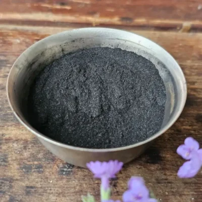 Activated charcoal powder and fresh lavender used in Velvet & Grit charcoal face scrub