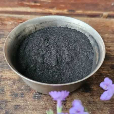Activated charcoal powder and fresh lavender used in Velvet & Grit charcoal face scrub
