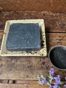 Black Lavender Charcoal Soap bar on ceramic dish by Backyard Bees