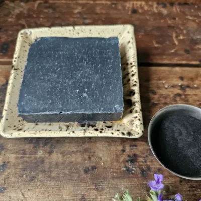 Black Lavender Charcoal Soap bar on ceramic dish by Backyard Bees