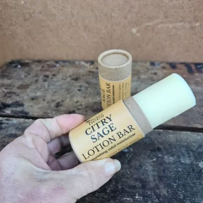 Citry-Sage-Lotion-Bar-Open Open Citry Sage Lotion Bar pushed up to show solid moisturizer inside