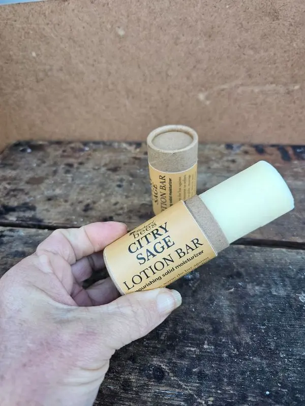 Citry-Sage-Lotion-Bar-Open Open Citry Sage Lotion Bar pushed up to show solid moisturizer inside