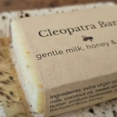 Closeup of Backyard Bees Cleopatra bar on rustic background