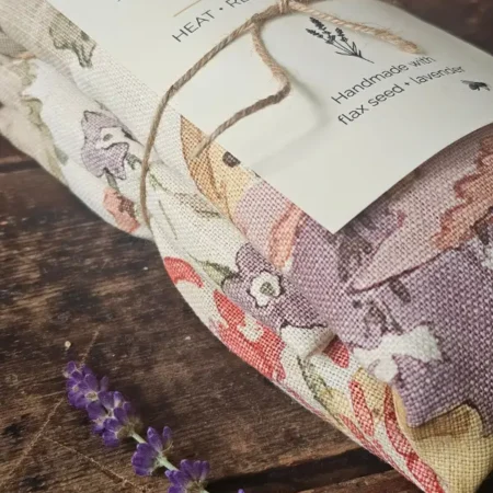 Close-up of floral fabric on a handmade lavender neck pillow