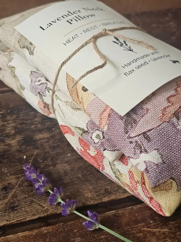 Close-up of floral fabric on a handmade lavender neck pillow