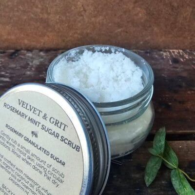 Rosemary Mint Sugar Scrub, part of the Velvet & Grit line, open jar to show sugared texture