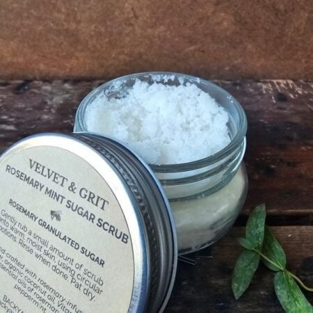 Rosemary Mint Sugar Scrub, part of the Velvet & Grit line, open jar to show sugared texture