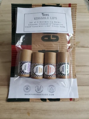 a package of 4 beeswax lip balms in eco friendly packaging