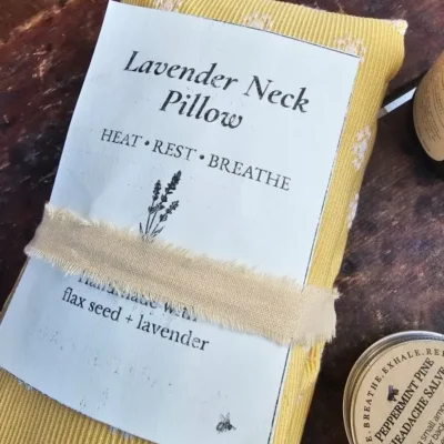 Lavender neck pillow wrapped in upcycled fabric and cream belly band with frayed cotton ribbon
