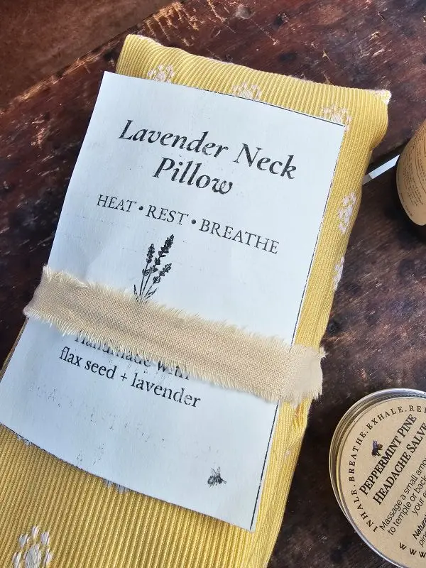 Lavender neck pillow wrapped in upcycled fabric and cream belly band with frayed cotton ribbon