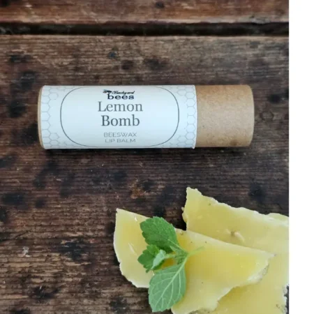 Lemon balm and beeswax used to make Backyard Bees Lemon Bomb lip balm