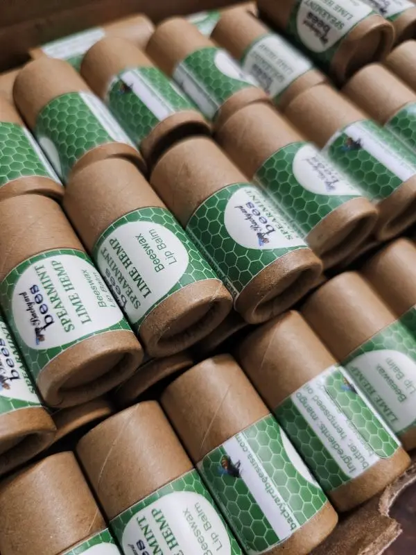Lip Balm Spearmint Close rows of plastic free lip balm in paper tubes - spearmint hemp flavor