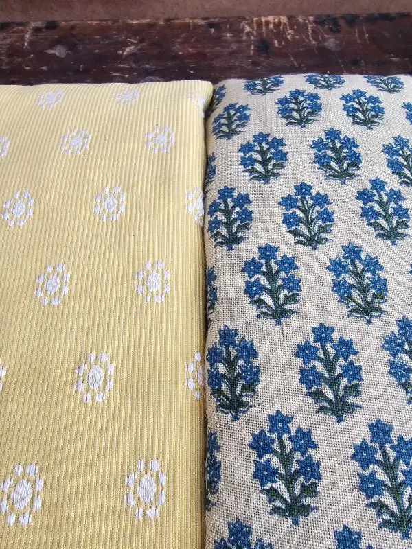 Side-by-side comparison of Lavender Neck Pillow color options: Butter Yellow and Blue Lavender Print