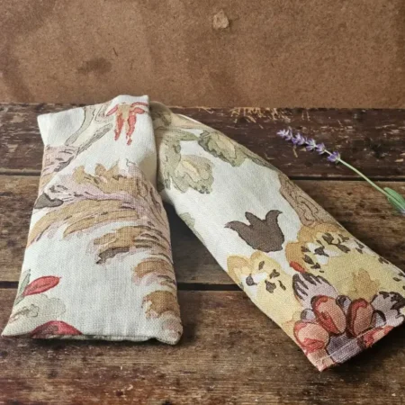 Open floral lavender neck pillow filled with flaxseed and lavender