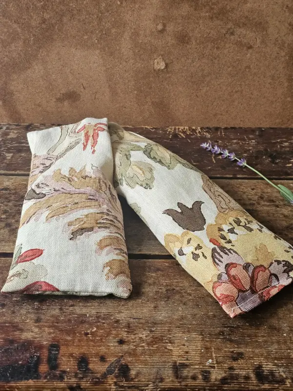 Open floral lavender neck pillow filled with flaxseed and lavender