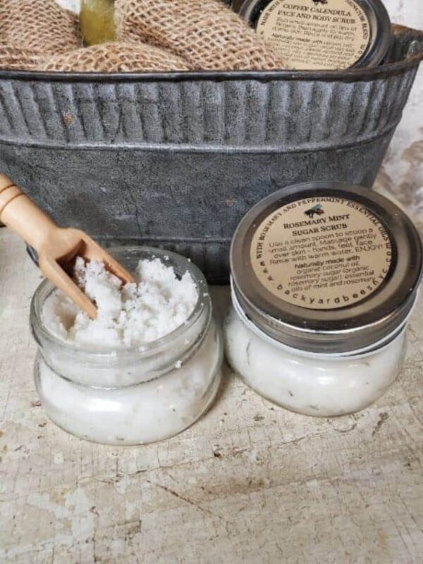 rosemary mint sugar scrub in small mason jars