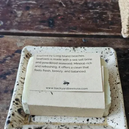 Back label of Seafoam mineral bar on soap dish