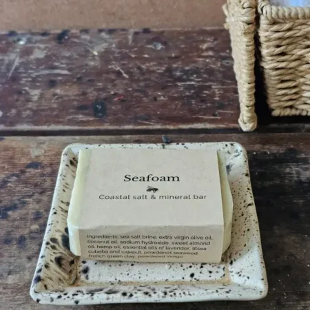 Seafoam seaweed soap styled with rustic textiles