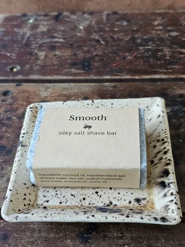 Smooth ladies shave soap on rustic soapdish
