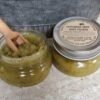 Southern Sexy 2 small mason jars of Southern Sexy body polish and salt scrub one is open
