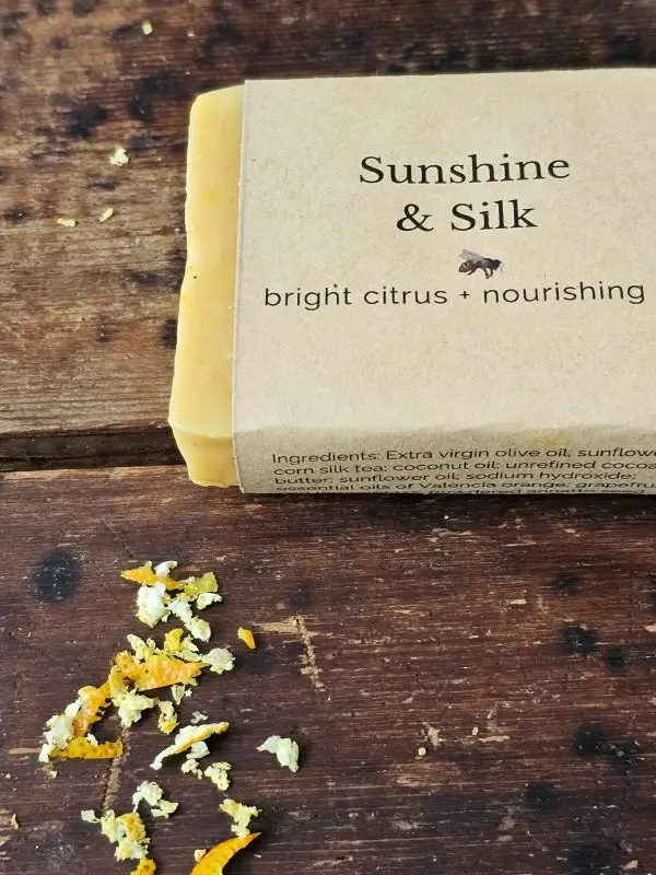 Close-up of Sunshine and Silk soap with bright citrus tones