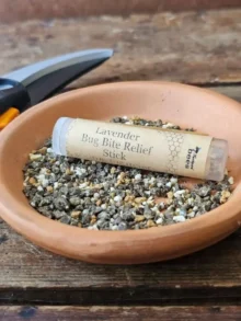 Lavender bug bite relief stick made with beeswax and lavender infused oils to soothe itchy bug bites.