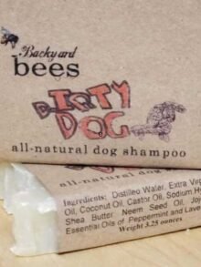 two chunks of off white dog shampoo bars with natural ingredients