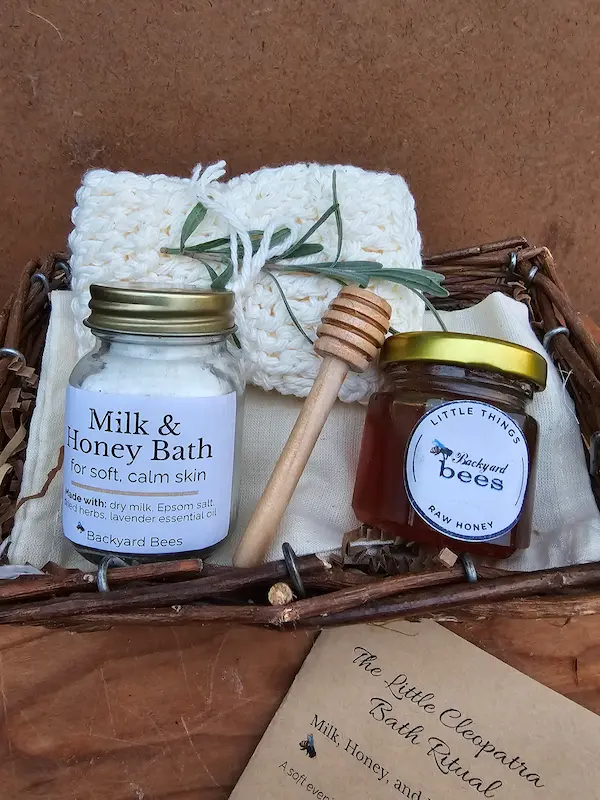 Raw honey and wooden dipper from the ritual set, ready to sweeten tea or the bath.