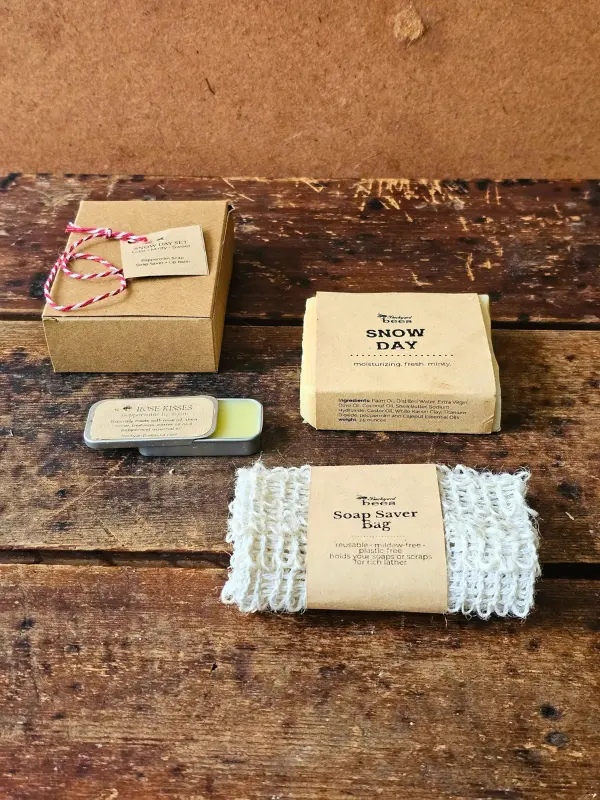 Snow Day Flat Lay Snow Day gift set with peppermint soap, sisal soap saver and Rose Kisses lip balm