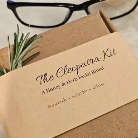 The Cleopatra Kit wrapped in kraft band with rosemary - gift-ready packaging.