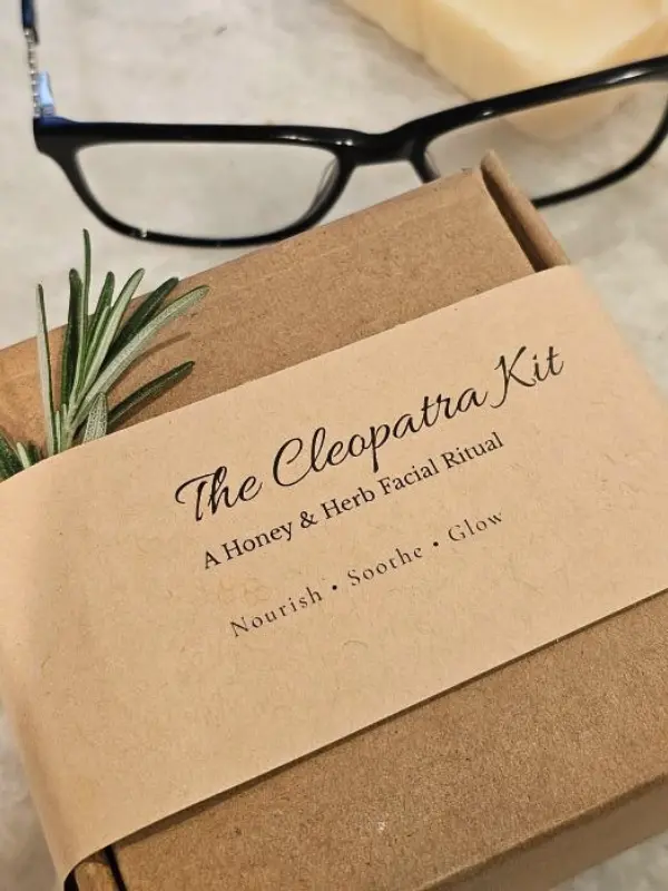 The Cleopatra Kit wrapped in kraft band with rosemary - gift-ready packaging.