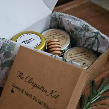 Unboxing The Cleopatra Kit - honey, herbal masks, and facial ritual booklet inside kraft box.