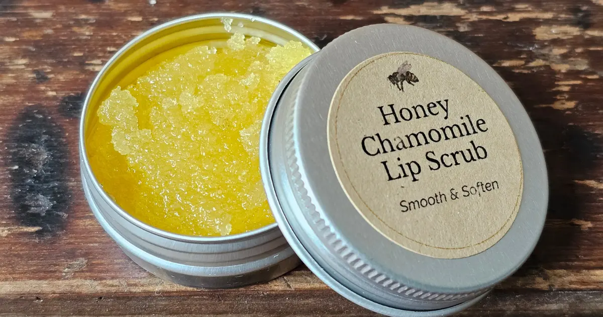 close up of Backyard Bees natural honey lip scrub with sea buckthorn oil