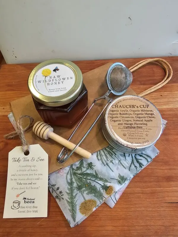 Take-Tea-And-See-Flat-Lay Honey, tea, and accessories on wood