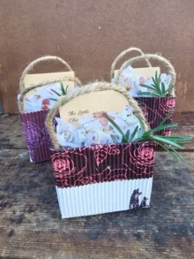 The Little Cleopatra Facial Mini honey and herb facial kits in hand-wrapped upcycled gift bags