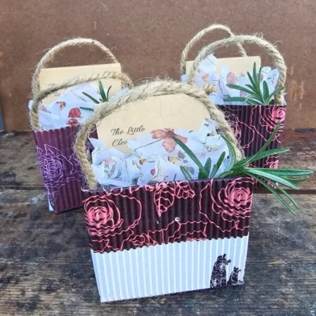 The Little Cleopatra Facial Mini honey and herb facial kits in hand-wrapped upcycled gift bags