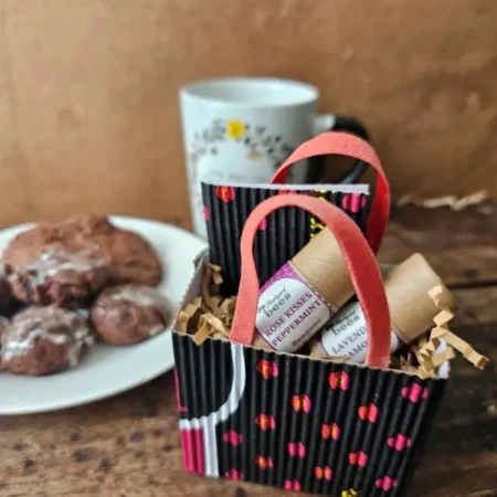 Sweet Little Things eco-friendly Valentines Day gift, with homemade chocolate cookies and tea on rustic wood table