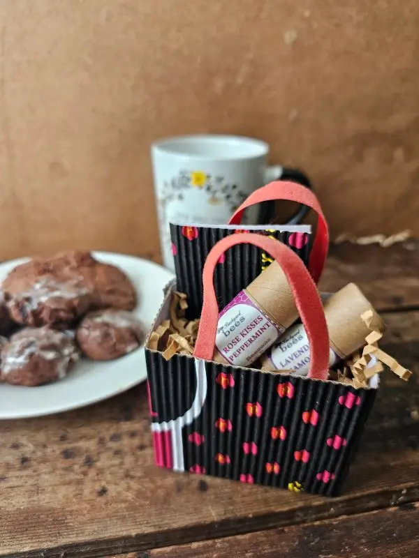 Sweet Little Things eco-friendly Valentines Day gift, with homemade chocolate cookies and tea on rustic wood table
