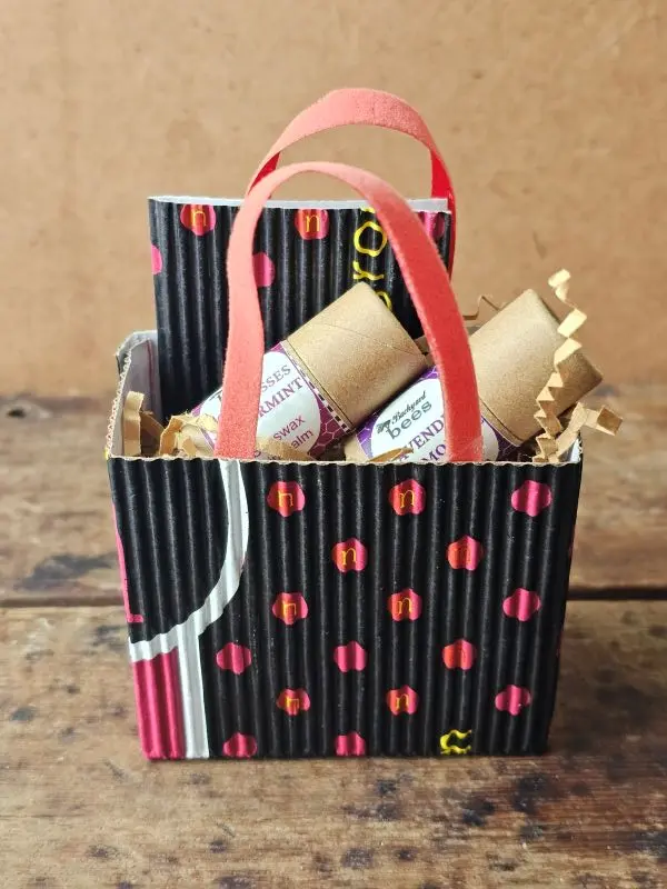 Sweet Little Things gift bag with two Backyard Bees lip balms