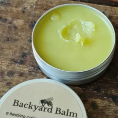 Backyard Balm Texture Close-up of Backyard Balm texture showing thick calendula comfrey salve consistency