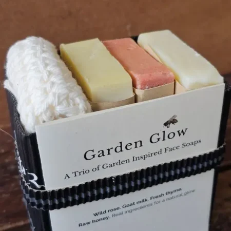 Garden Glow Facial Soaps Garden Glow facial soap trio wild rose, lavender goat milk, and face thyme bars in eco-friendly corrugated box with organic cotton face cloth