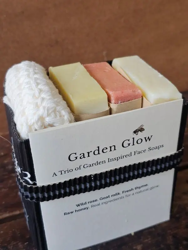 Garden Glow facial soap trio wild rose, lavender goat milk, and face thyme bars in eco-friendly corrugated box with organic cotton face cloth
