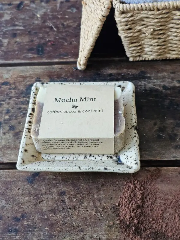 Rustic soap dish with a bar of Mocha Mint Soap by Backyard Bees