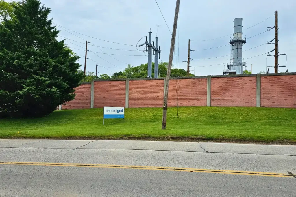 National Grid brick wall and green grass corporate landscaping