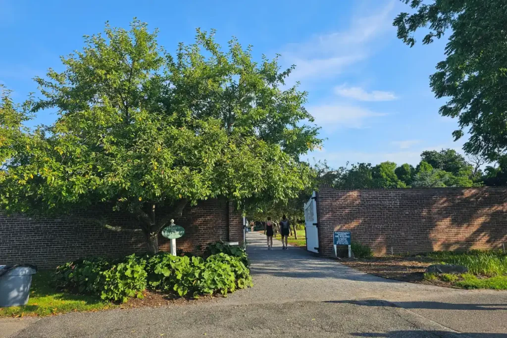 The Walled Garden At Caumsett State Park 4 Entrance to the Walled Garden at Caumsett State Park surrounded by tall brick walls and summer gardens.