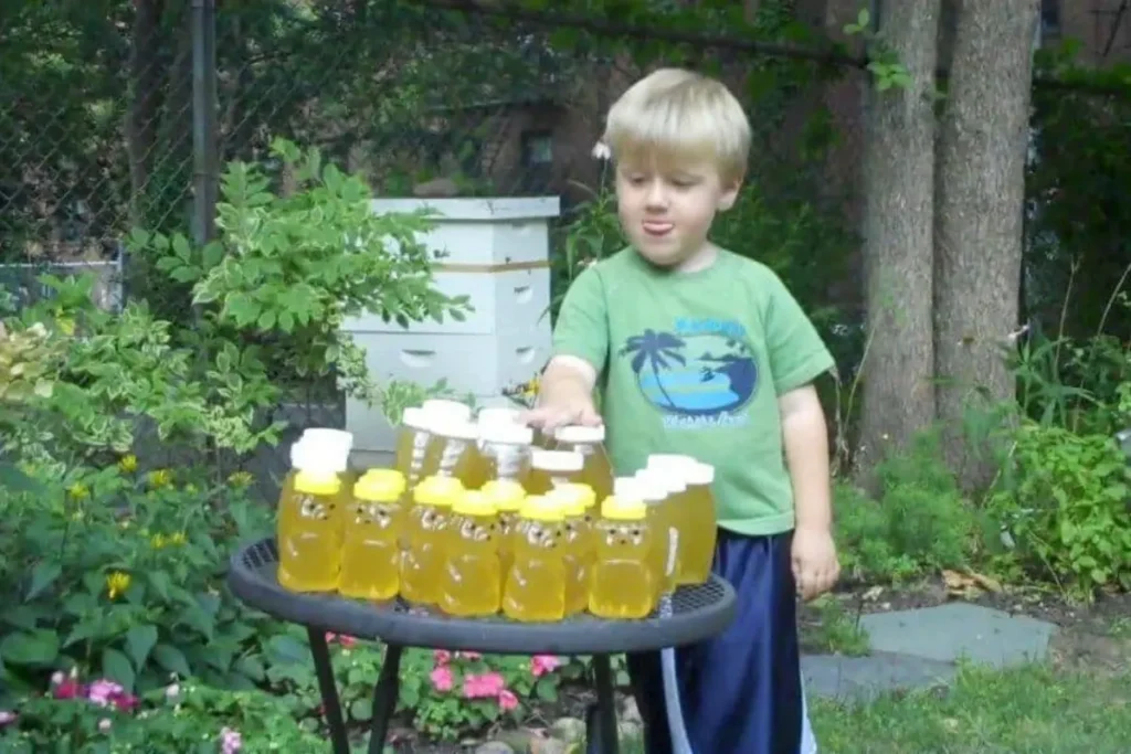 The Hive 9 Johnny with Backyard Bees' first honey harvest in 2010.