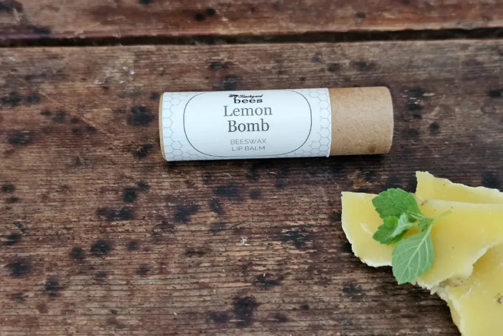 Fresh lemon balm and beeswax used to make Lemon Bomb lip balm