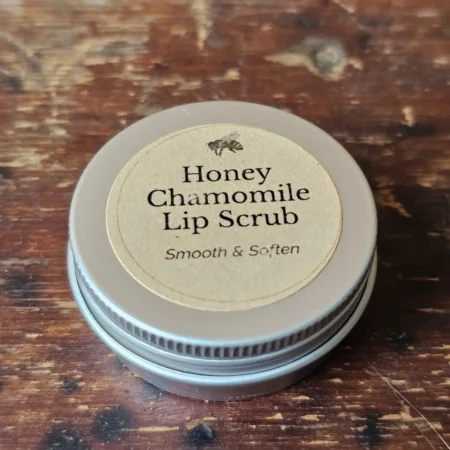 Backyard Bees Honey Chamomile Lip Scrub in closed silver tin with with kraft label